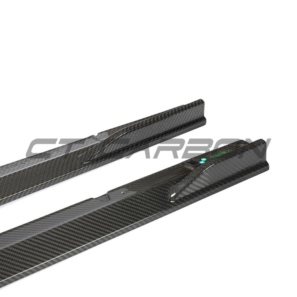Full Audi RS6 C8 Avant carbon fibre kit by CT Design, showcasing sleek carbon fibre accents on the car's exterior.