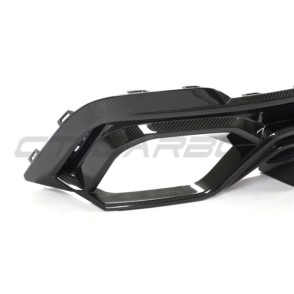 Audi RS6 C8 full carbon fibre kit by CT Design, showing the front bumper diffuser with sleek carbon fiber finish.