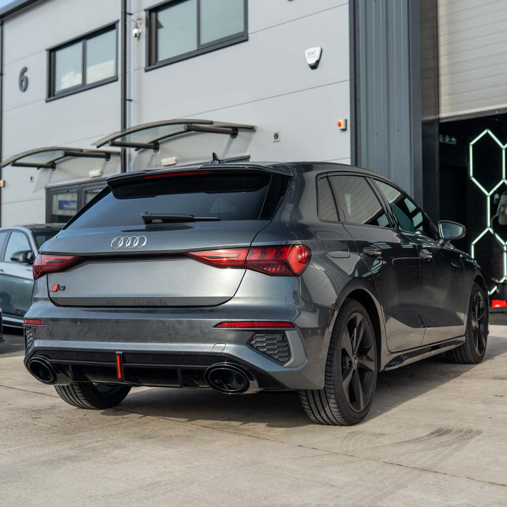 CT Carbon gloss black diffuser with tips and LED light for Audi S3/A3 8Y S-Line, showcasing sleek design and performance features.