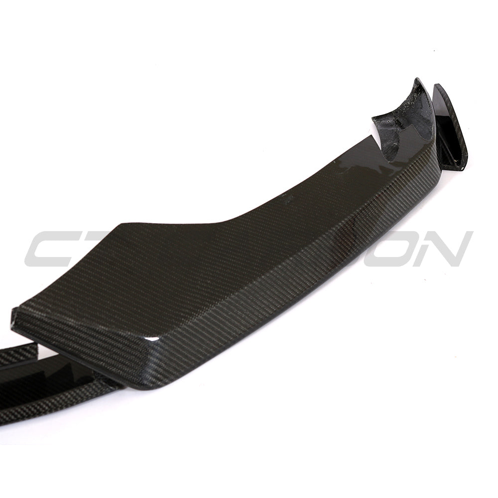 Carbon fiber splitter for Audi TTRS Quattro MK3 2015-2020, designed as a sleek spoiler enhancement by CT Carbon.