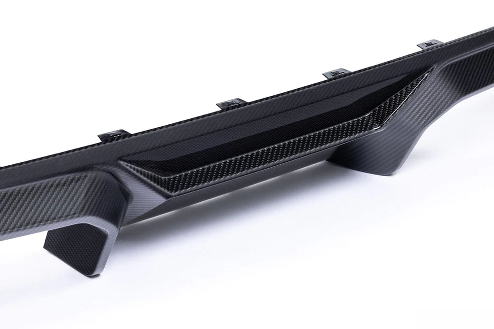 AlphaN ALPHA-N Carbon Rear Diffuser for BMW M2 G87 showing the sleek carbon fiber design and aerodynamic features.