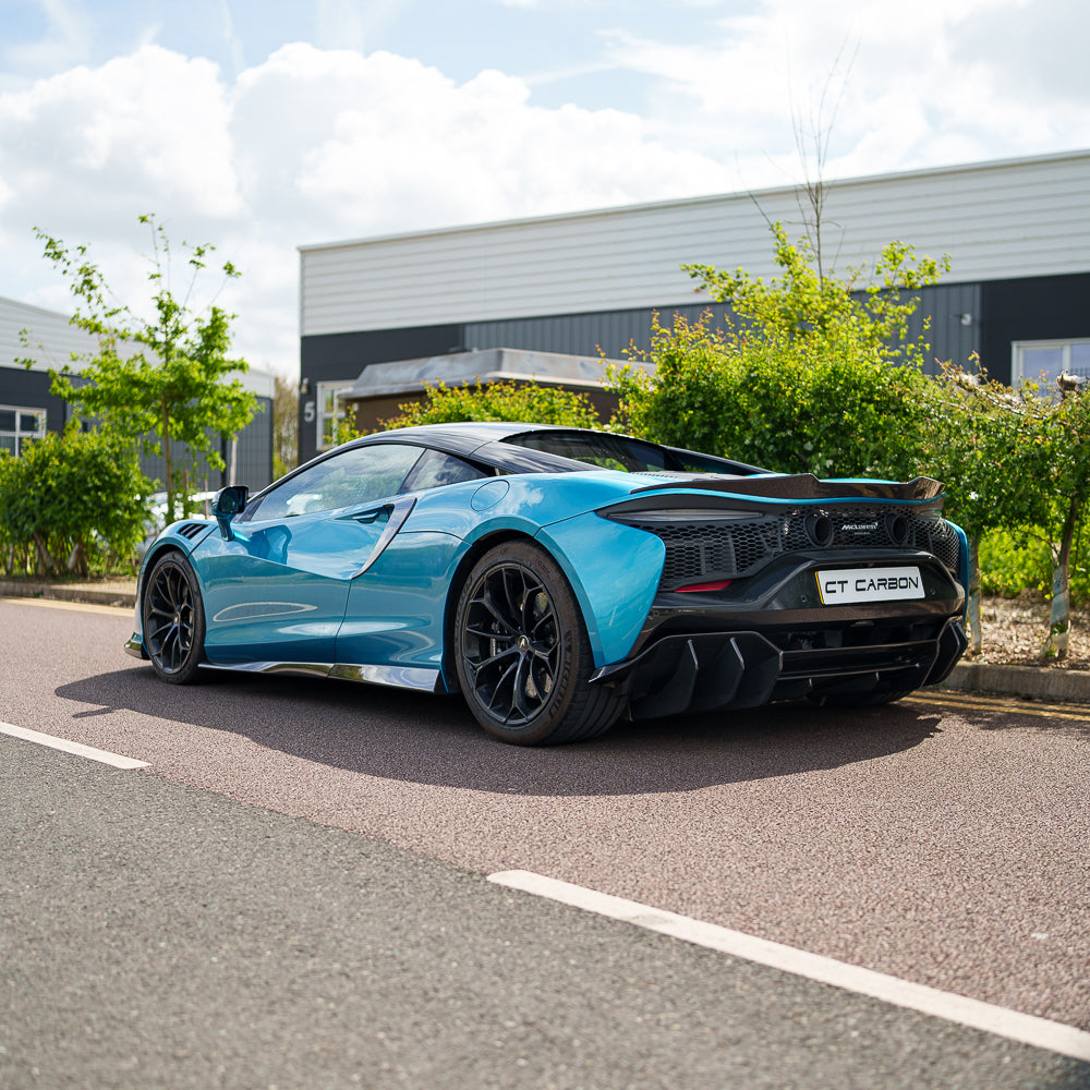 Carbon fibre side skirts for McLaren Artura 2023 by CT Carbon, showcasing sleek, aerodynamic design and high-quality craftsmanship.