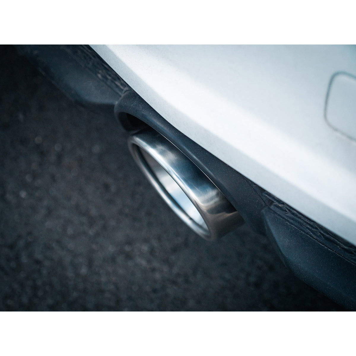 Cobra Sport cat back exhaust installed on Audi TT Mk3 2.0 TFSI FWD, showcasing the performance exhaust system in a lifestyle setting.