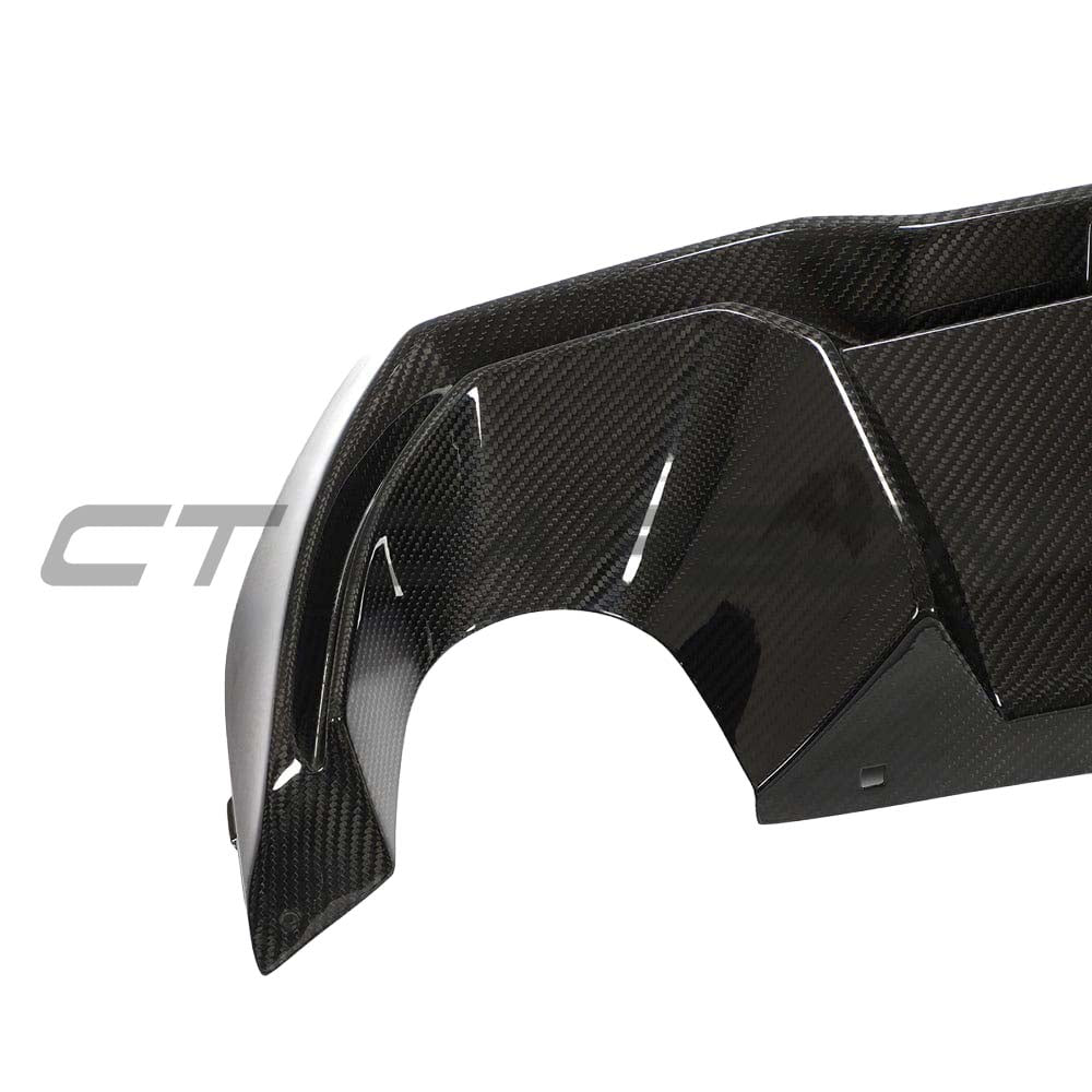 BMW 1 Series F40 CT Design carbon fiber diffuser installed on the rear of the car, showcasing sleek, lightweight aerodynamic design.