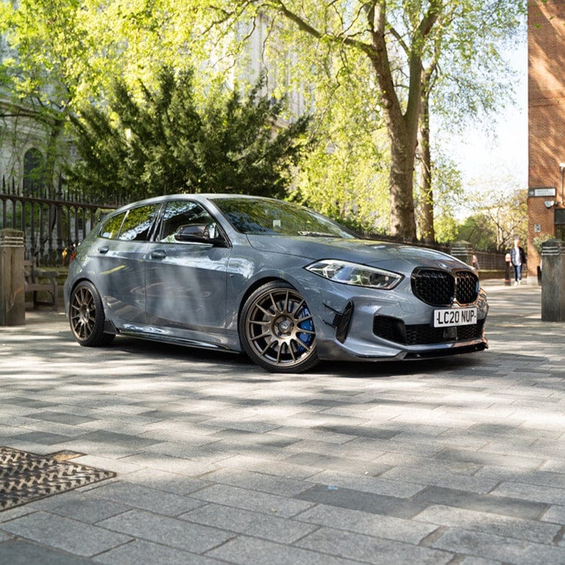 BMW 1 Series F40 carbon fibre splitter by CT Design installed on front bumper, showcasing sleek, lightweight aerodynamic enhancement.