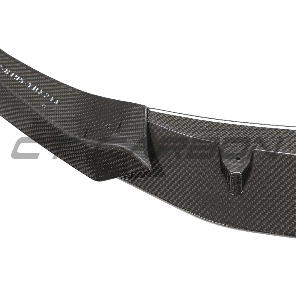 BMW 1 Series F40 carbon fibre splitter by CT Design installed on the front bumper, enhancing sporty appearance.