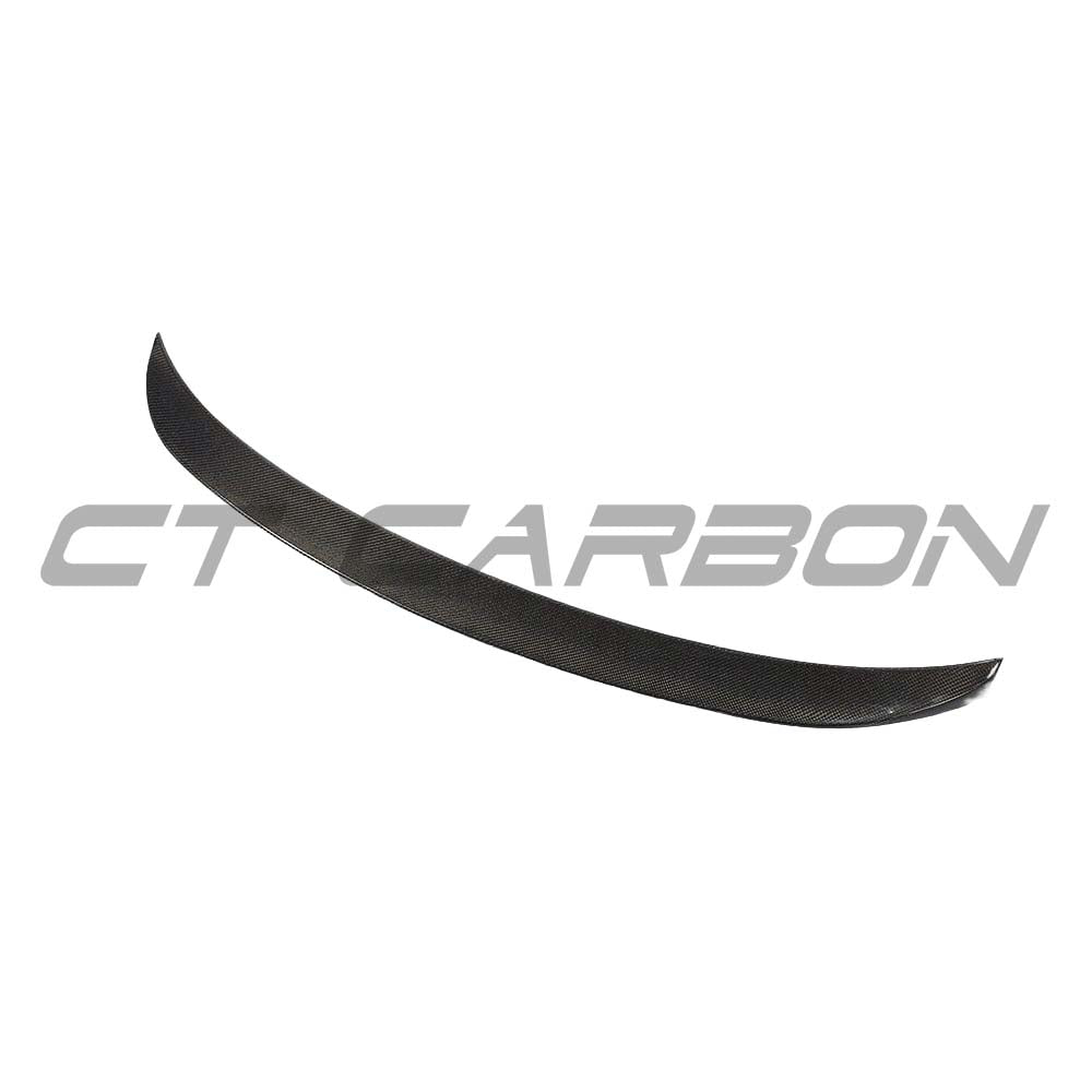 BMW M3 G80 G20 spoiler by CT Carbon in wet carbon fiber, OEM-style sports car spoiler for enhanced aerodynamic performance.