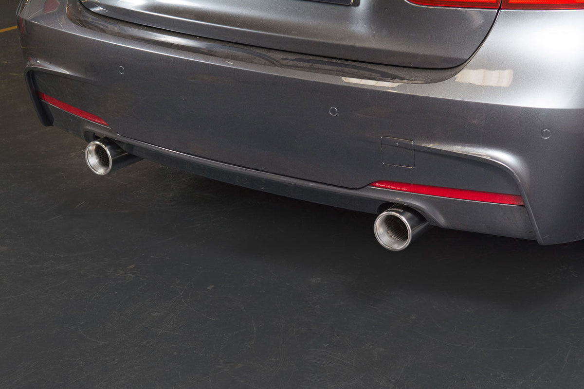 Cobra Sport dual exit exhaust conversion installed on a BMW 330D F31, showcasing the stylish dual tailpipe design.