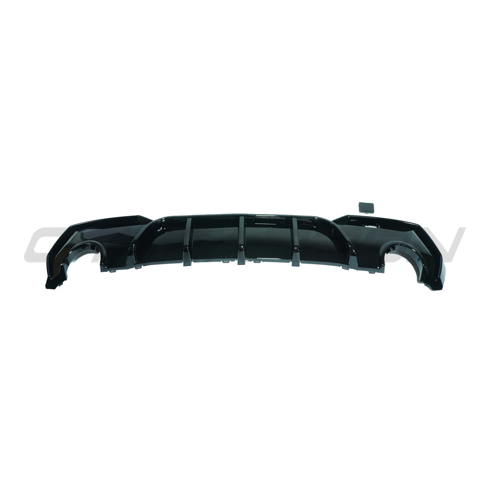 BMW G22 G23 4 Series 2020-2024 CT Carbon gloss black round tip diffuser installed on rear bumper.