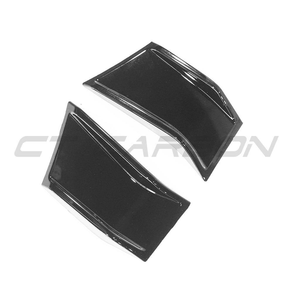 Gloss black vent accessories for BMW 4 Series G22 G23 by CT Carbon, shown on the car's side panel.