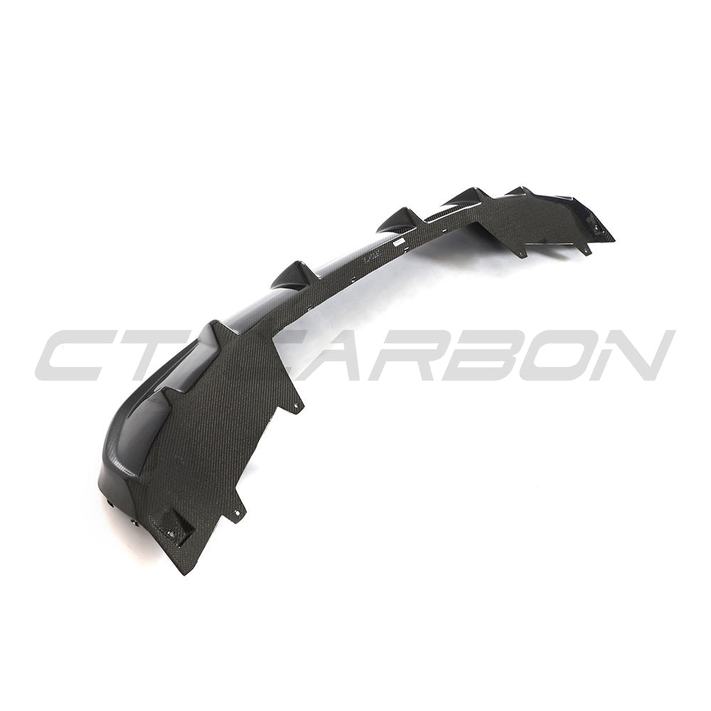 BMW 4 Series G26 i4 CT Carbon fiber diffuser, V1, showcasing sleek carbon fiber design for enhanced aerodynamics and style.