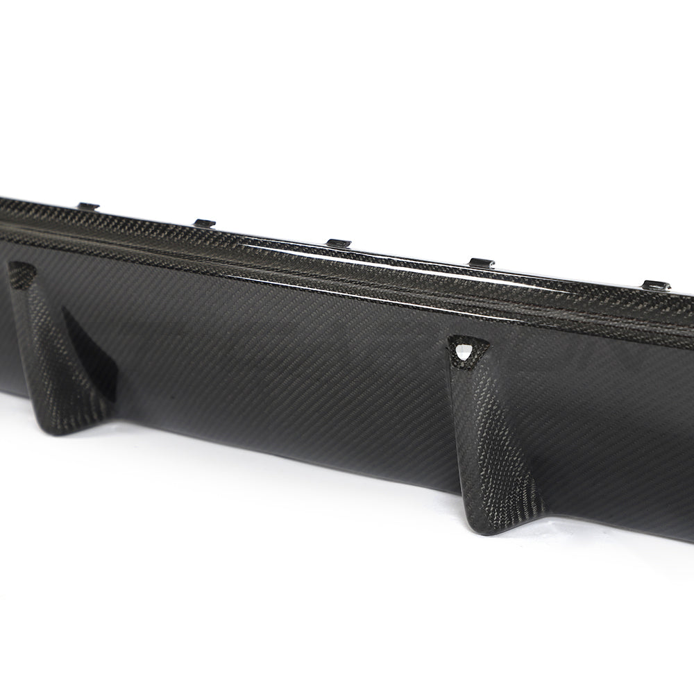 BMW 4 Series G26 i4 carbon fibre diffuser by CT Carbon, showcasing sleek design and aerodynamic features.