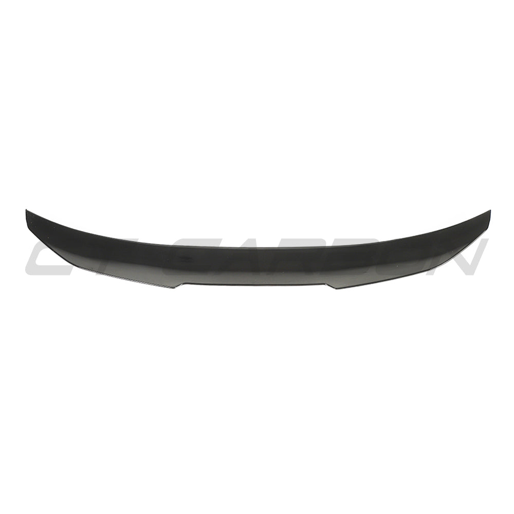 BMW 5 Series G30 gloss black V6 spoiler by CT Carbon, close-up view showing sleek aerodynamic design and glossy finish.