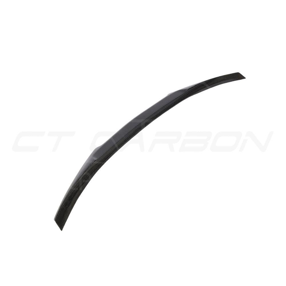 BMW F36 4 Series Coupe full carbon fiber kit with dual exhaust from CT Carbon, showcasing sleek carbon fiber components and sporty design.