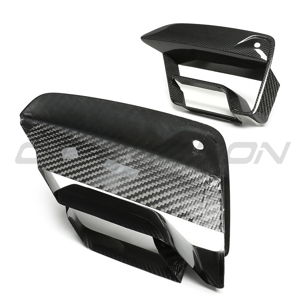 BMW F90 M5 2021+ LCI carbon fibre bumper vent covers by CT Carbon, showing close-up of vent details and sleek black finish.