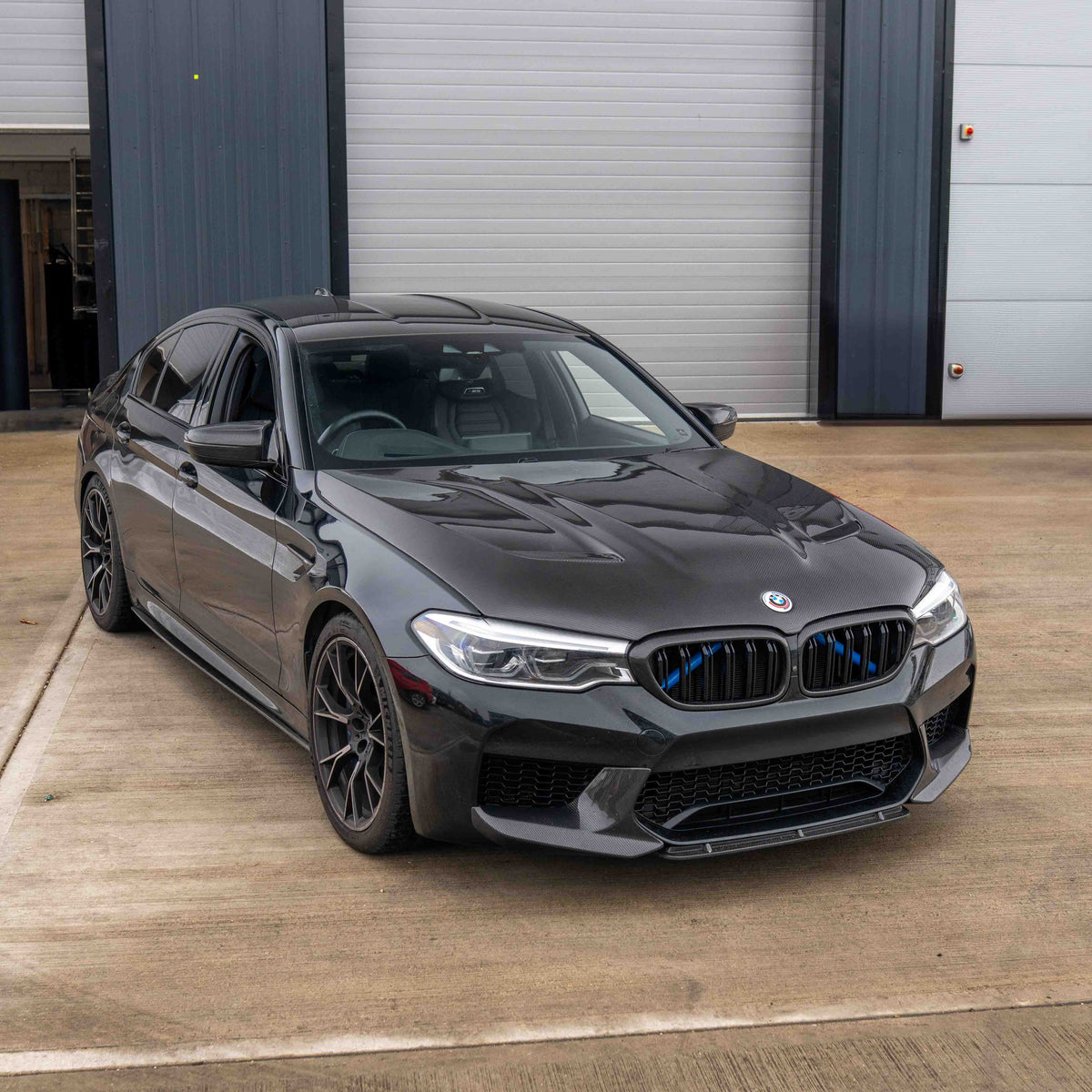 BMW F90 M5 and G30 5 Series carbon fiber bonnet by CT Carbon, showcasing sleek, lightweight racing-inspired car hood.