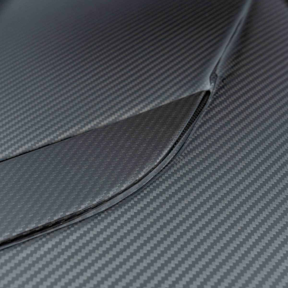 BMW F90 M5 and G30 5 Series carbon fibre bonnet by CT Carbon, showcasing the lightweight, aerodynamic design and glossy finish.