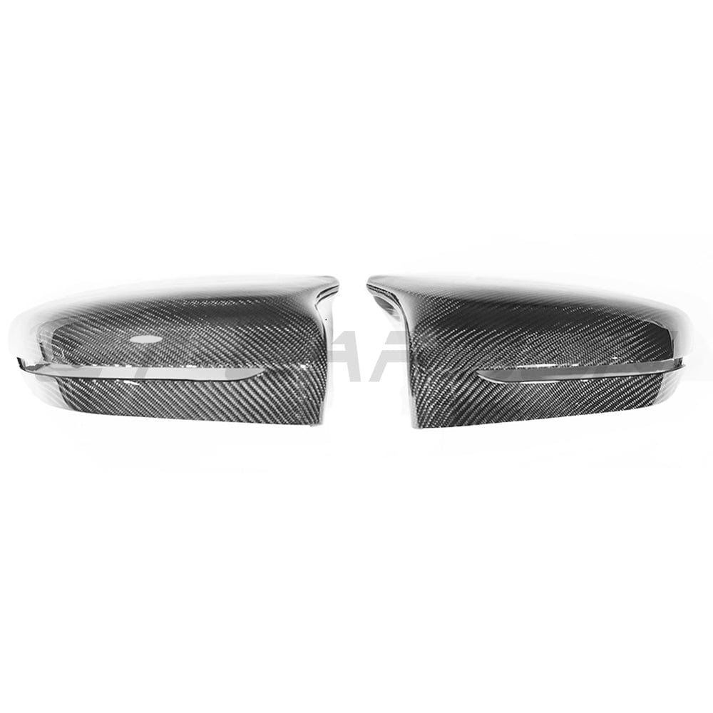 BMW F90 M5 Competition carbon fibre side mirrors by CT Carbon, LHD only, showcasing sleek, lightweight automotive accessory design.