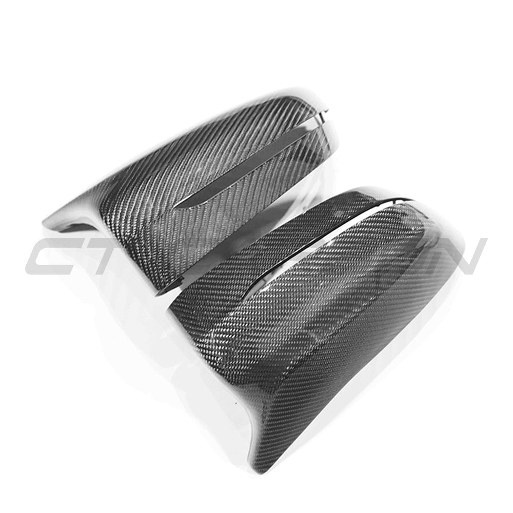 BMW F90 M5 Competition carbon fiber side mirrors by CT Carbon, race-inspired LHD accessories for enhanced look and performance.