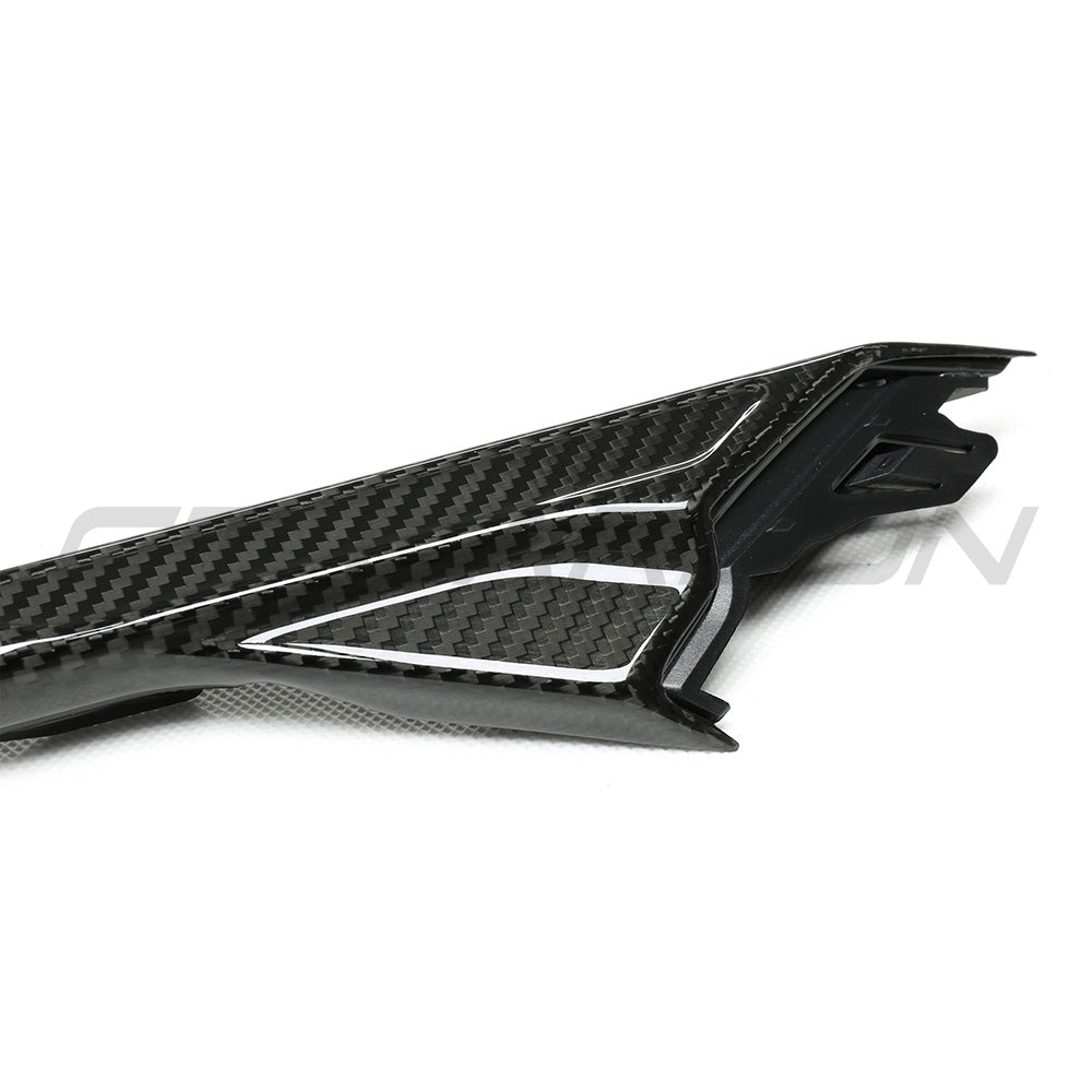BMW F90 M5 and M5 Competition carbon fiber fender trim accessory by CT Carbon, showcasing sleek black lightweight fender accents.