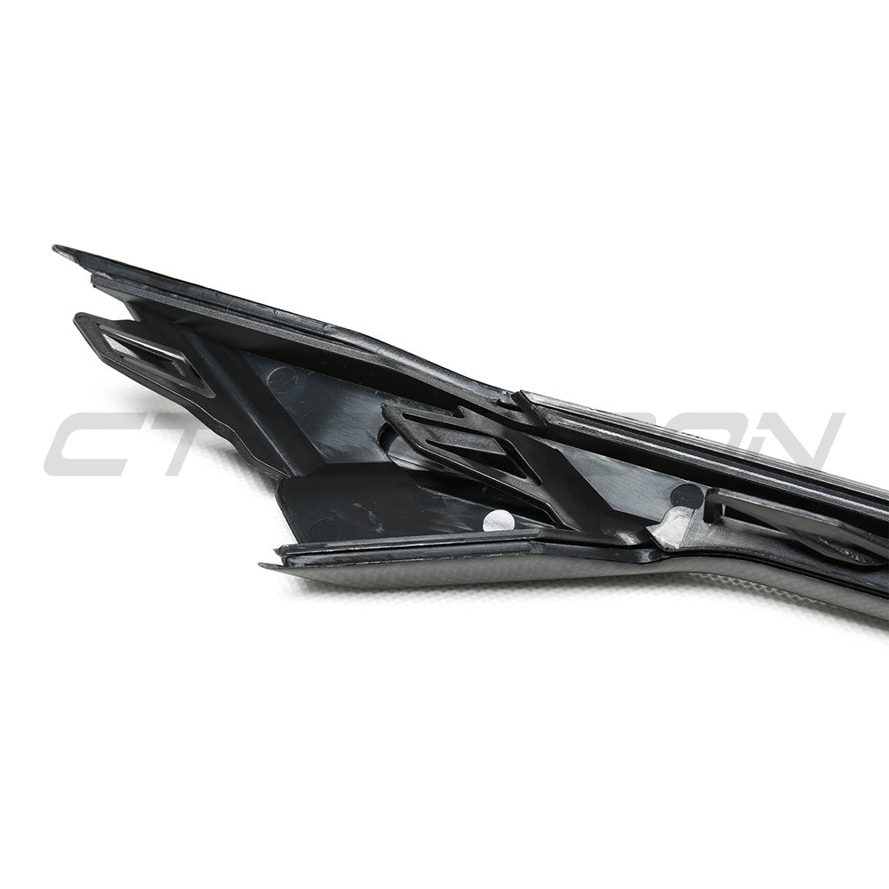 BMW F90 M5 and M5 Competition carbon fiber fender trim accessories by CT Carbon, showcasing sleek, lightweight car detailing.