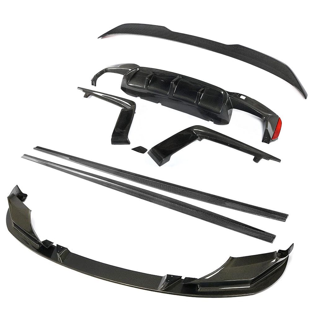 BMW F90 M5 saloon full carbon fibre kit by CT Carbon, includes front splitter, side skirts, and rear diffuser, all in carbon fiber.