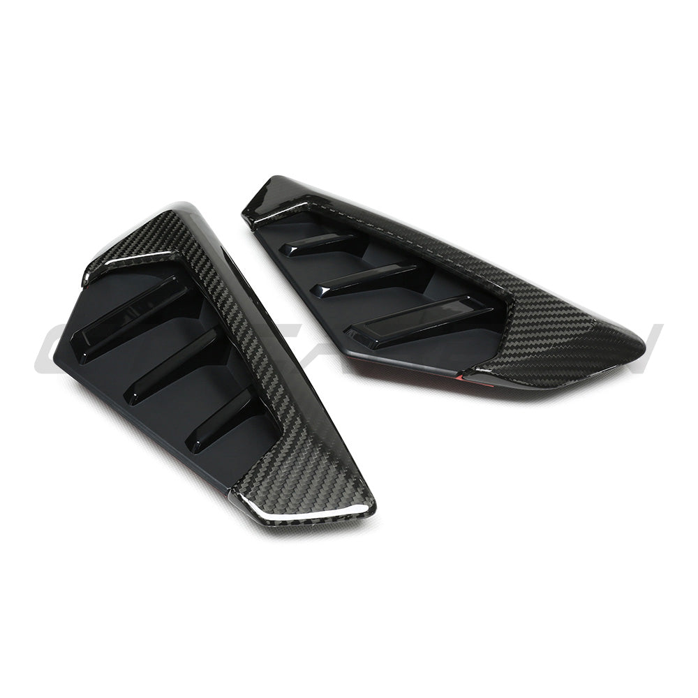 BMW F95 X5M 2023+ carbon fibre front fender trim by CT Carbon, showcasing sleek, lightweight accessory for vehicle enhancement.