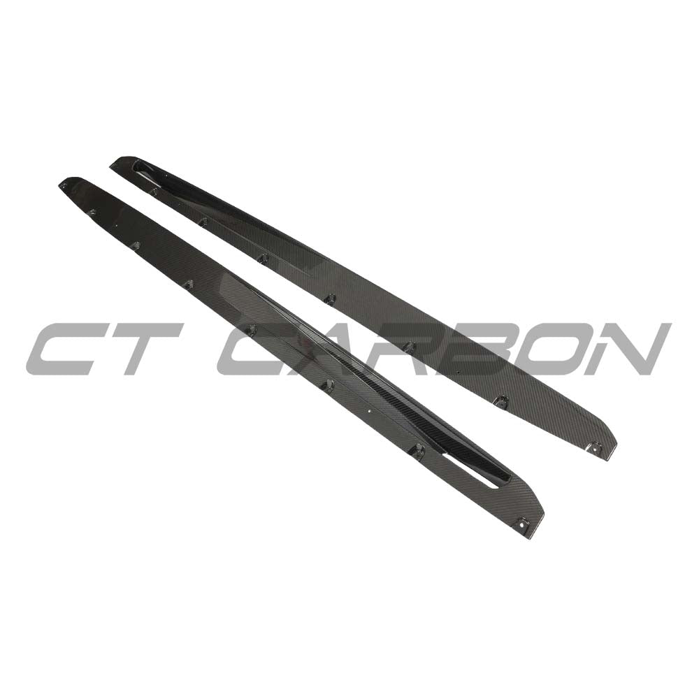 BMW G05 X5 LCI 2023+ CT Carbon fiber side skirts kit on the full car, showcasing sleek, lightweight carbon fiber design and finish.