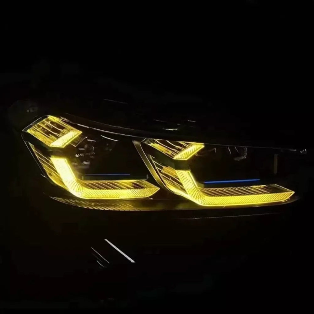 BMW G01 X3 LCI yellow adaptive DRL module set by CT Carbon, showing the bright yellow daytime running lights on the vehicle.