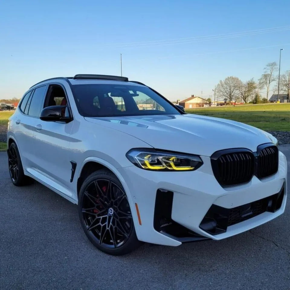 BMW G01 X3 LCI yellow adaptive DRL module set by CT Carbon, featuring bright yellow daytime running lights for 2022+ models.