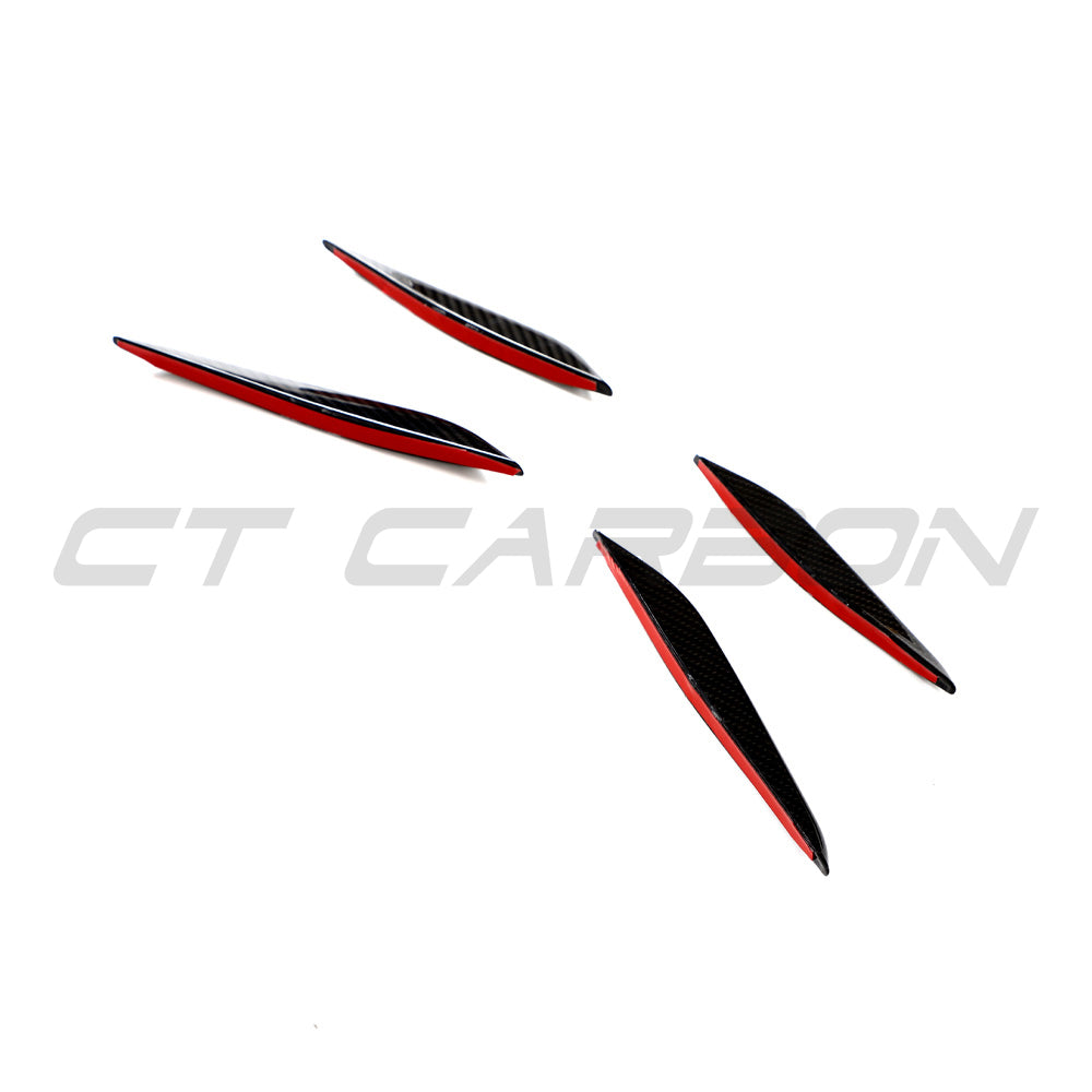 BMW G87 M2 carbon fibre front bumper canards by CT Carbon, lightweight aerodynamic car accessories mounted on the bumper.