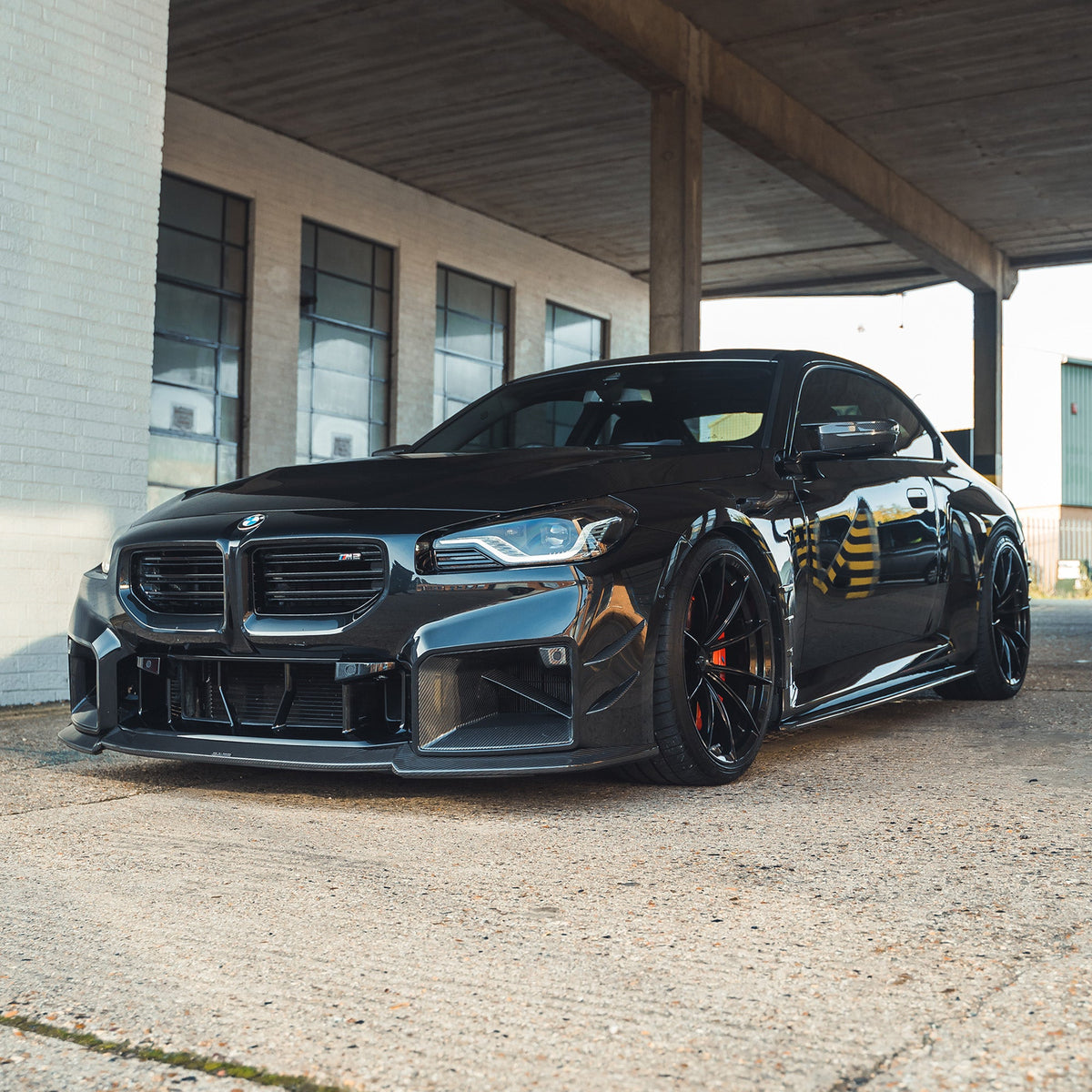 BMW G87 M2 carbon fibre front ducts accessory by CT Carbon, showing sleek, lightweight carbon fibre components for enhanced aerodynamics.