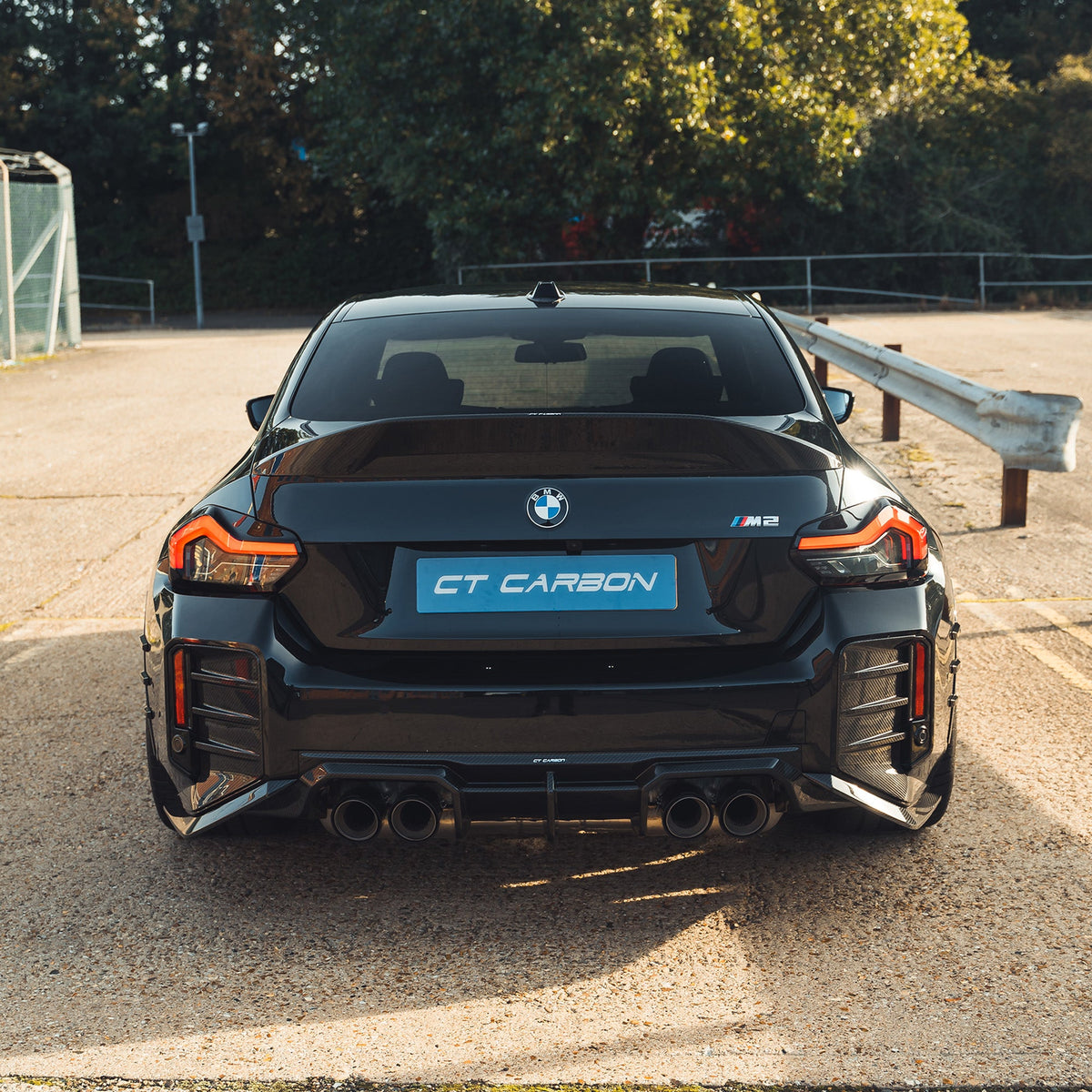 BMW G87 M2 carbon fibre rear bumper corners by CT Design, showcasing sleek, lightweight aerodynamic accessories for enhanced style.
