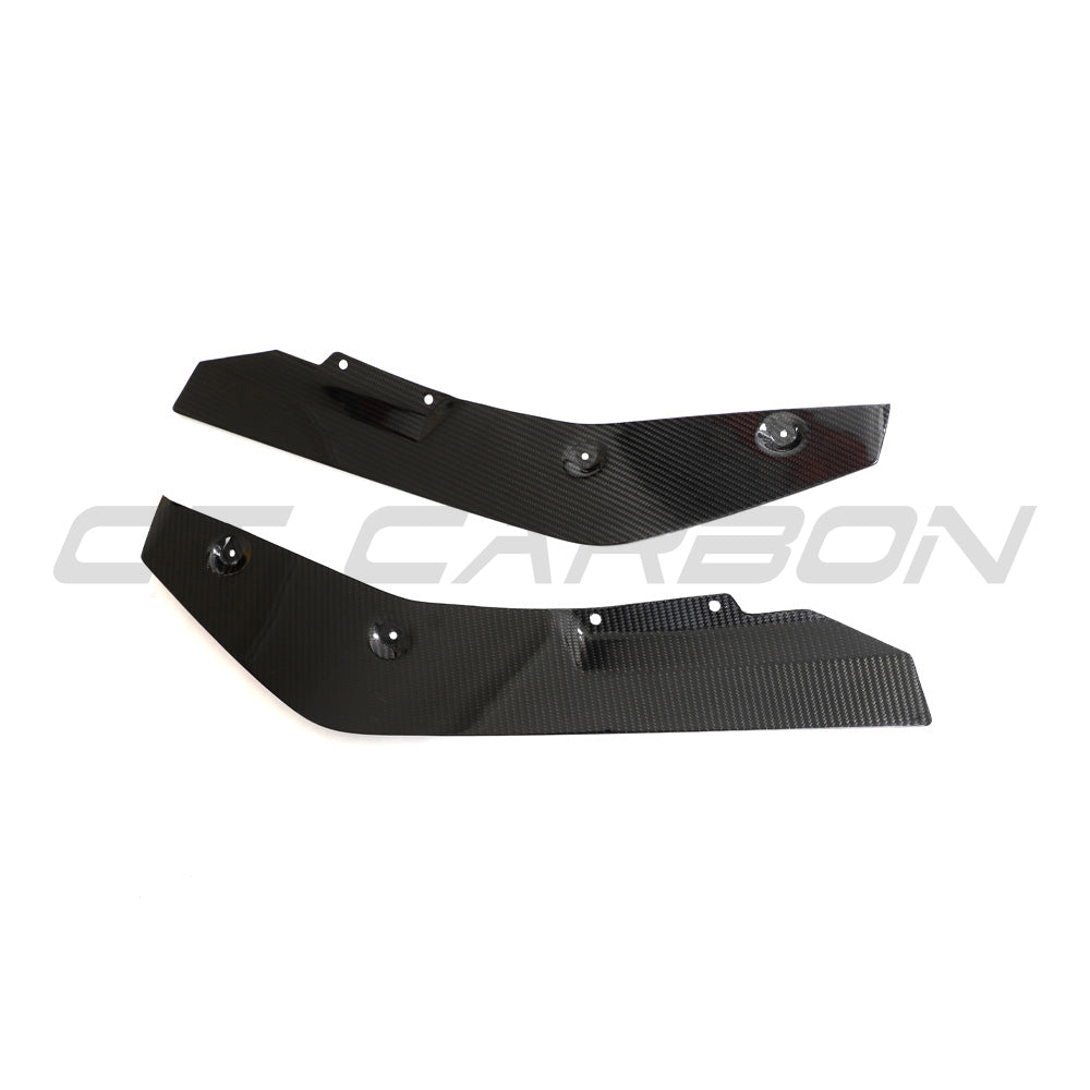 BMW G87 M2 carbon fibre rear bumper corners by CT Design, close-up of sleek carbon fiber accents on the vehicle's rear bumper.