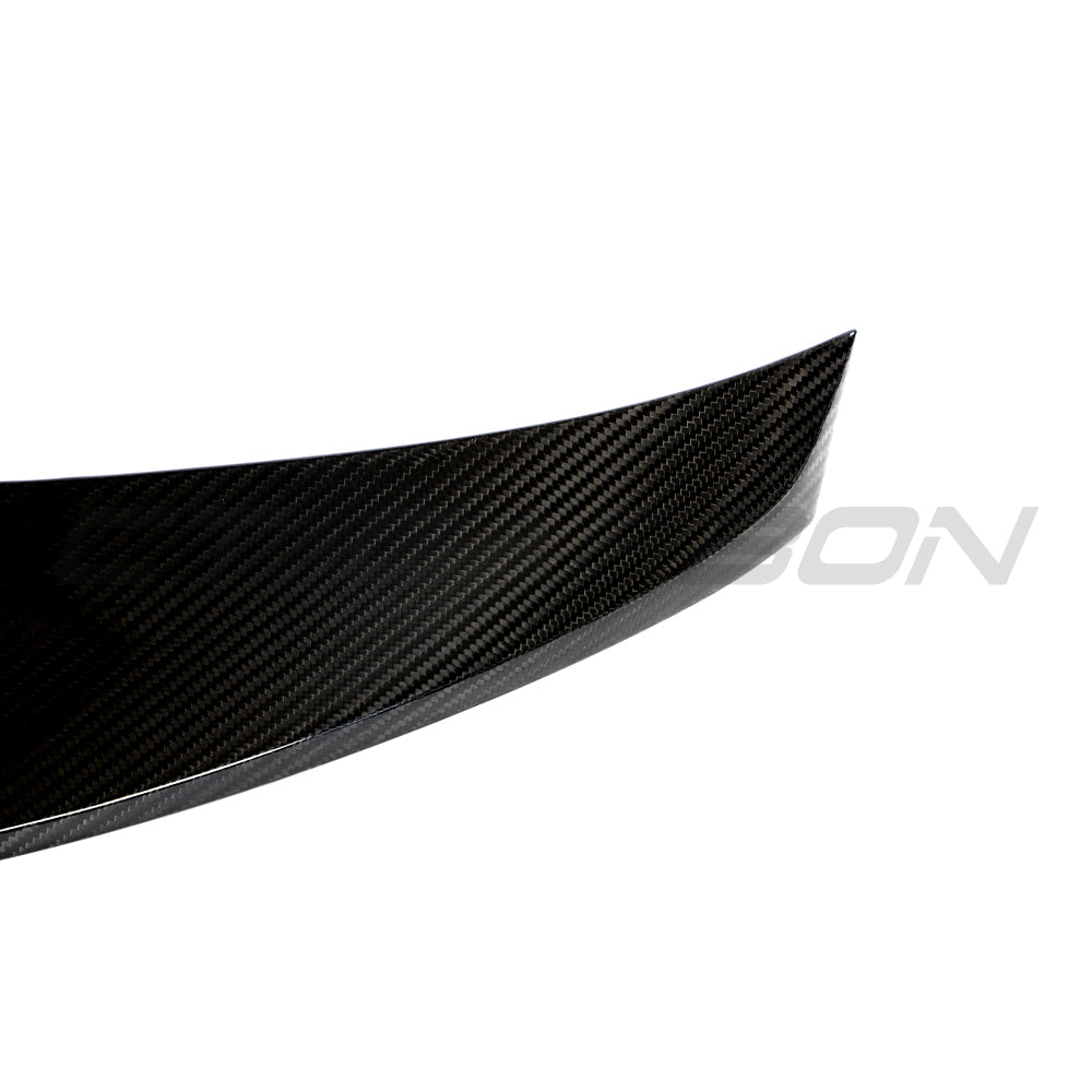 BMW G87 M2 and G42 2 Series Carbon Fibre Spoiler by CT Carbon, showcasing sleek, aerodynamic design on a sporty car.