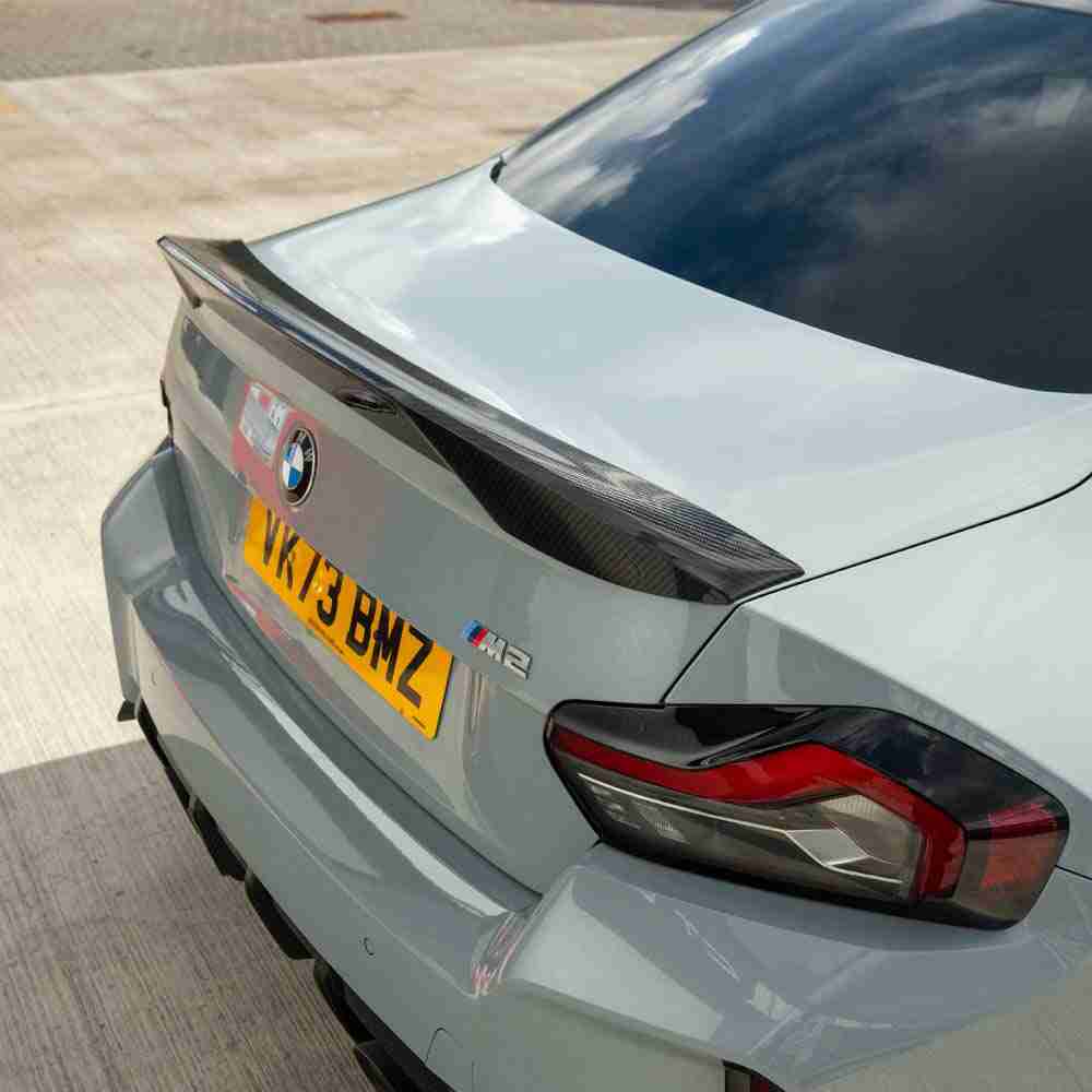 BMW G87 M2 and G42 2 Series carbon fibre spoiler by CT Design, featuring sleek aerodynamic design and high-quality carbon finish.