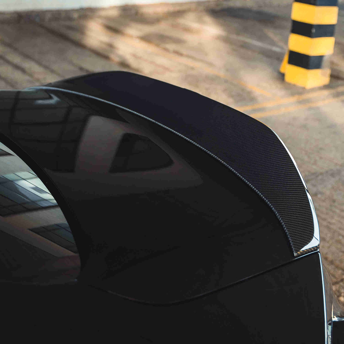 BMW G87 M2 and G42 2 Series carbon fibre spoiler by CT Design, showcasing sleek, lightweight aerodynamic design.