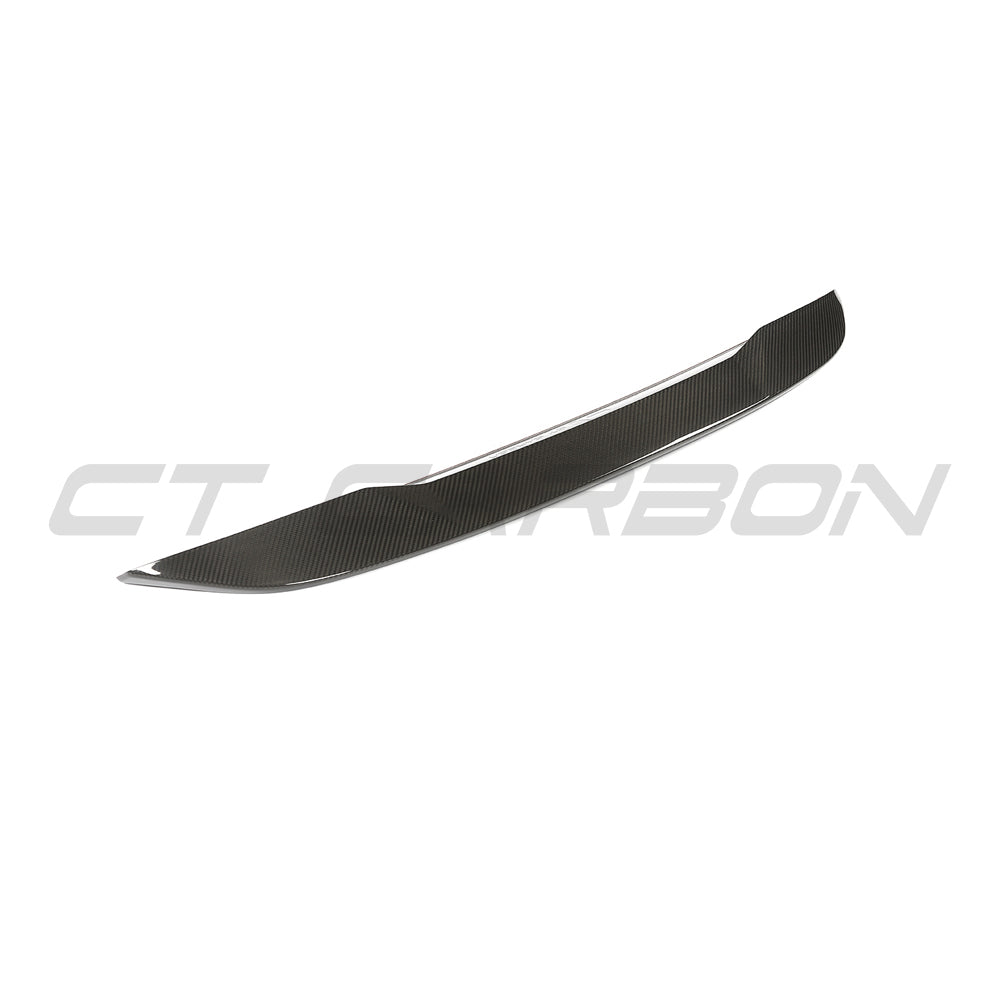 BMW G90 M5 and G60 5 Series 2023 carbon fibre spoiler by CT Design, showing sleek, aerodynamic design on a black car.