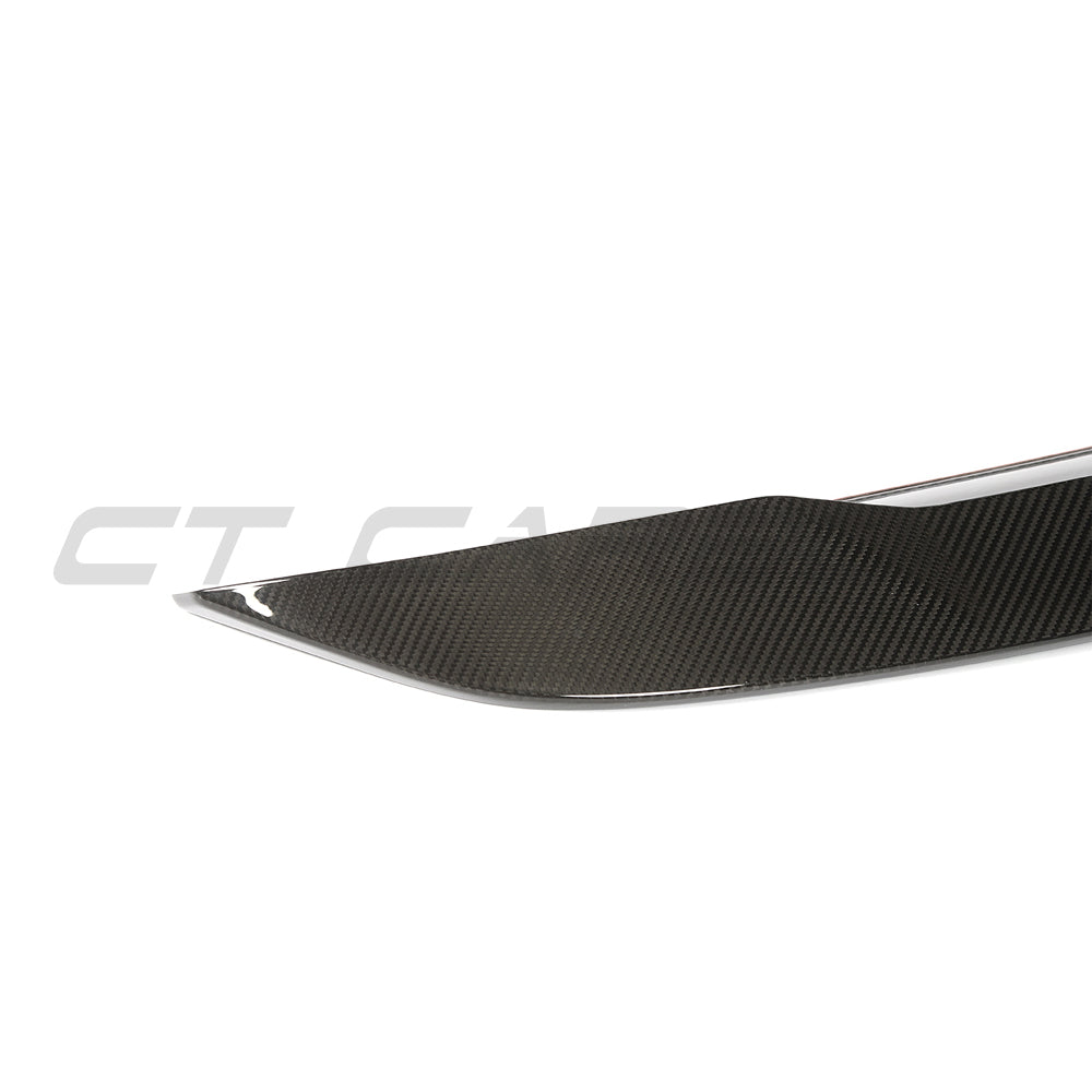 BMW G90 M5 and G60 5 Series 2023 carbon fibre spoiler by CT Design, showing sleek aerodynamic design on the vehicle's rear.