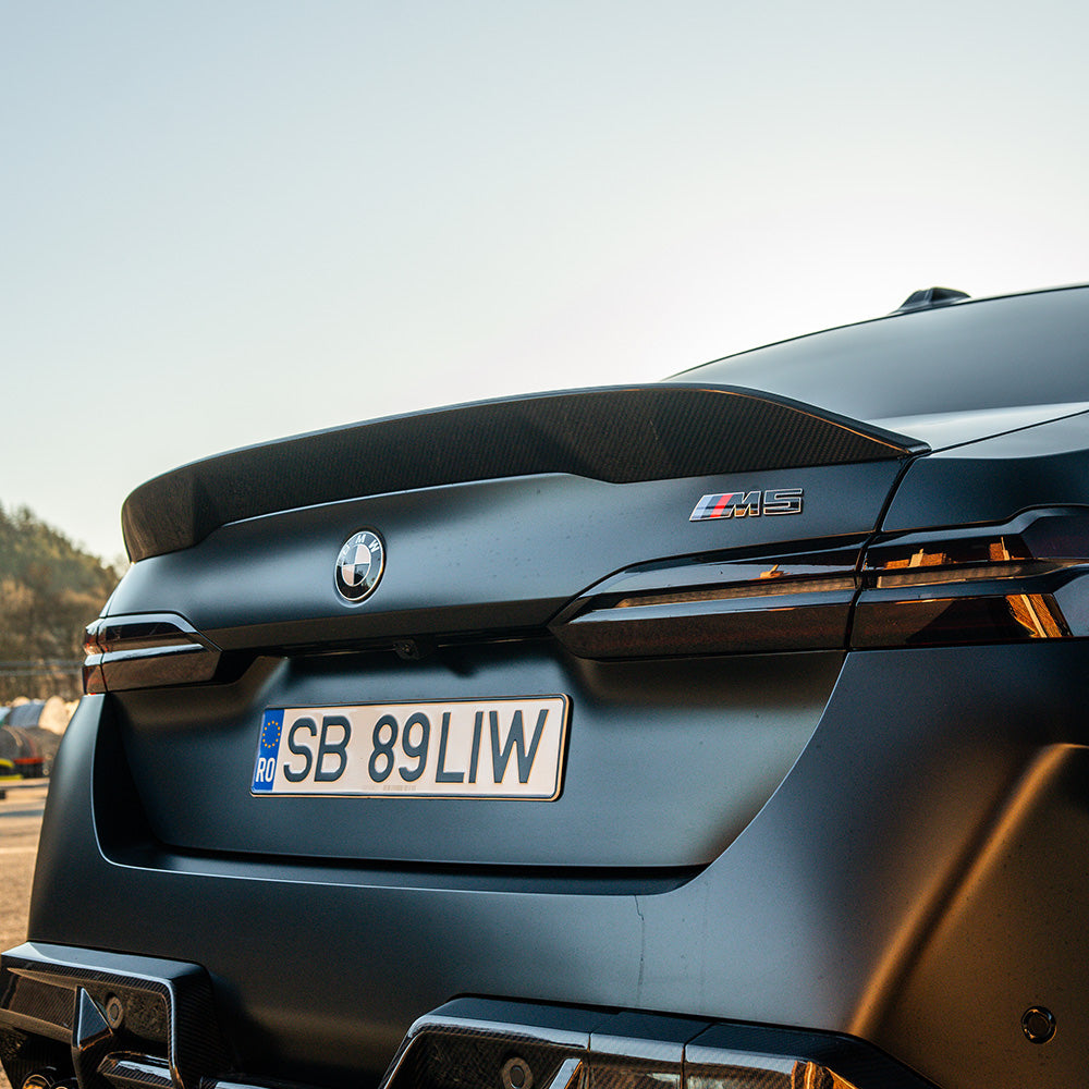 BMW G90 M5 and G60 5 Series 2023 carbon fiber spoiler by CT Design, showcasing the sleek, aerodynamic rear wing for enhanced performance.