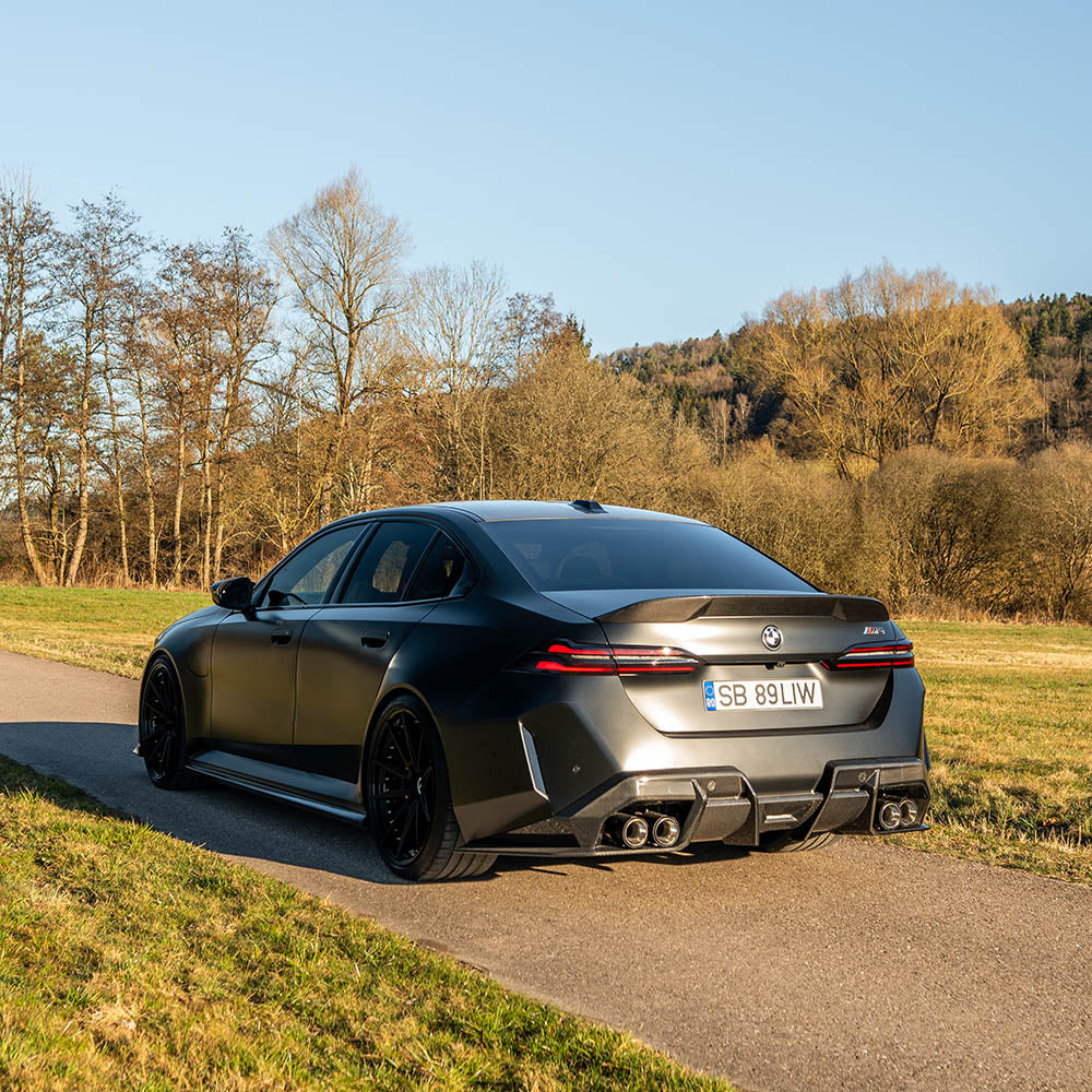 BMW G90 M5 and G60 5 Series 2023 carbon fibre spoiler by CT Design, showcasing sleek aerodynamic design on a sporty vehicle.