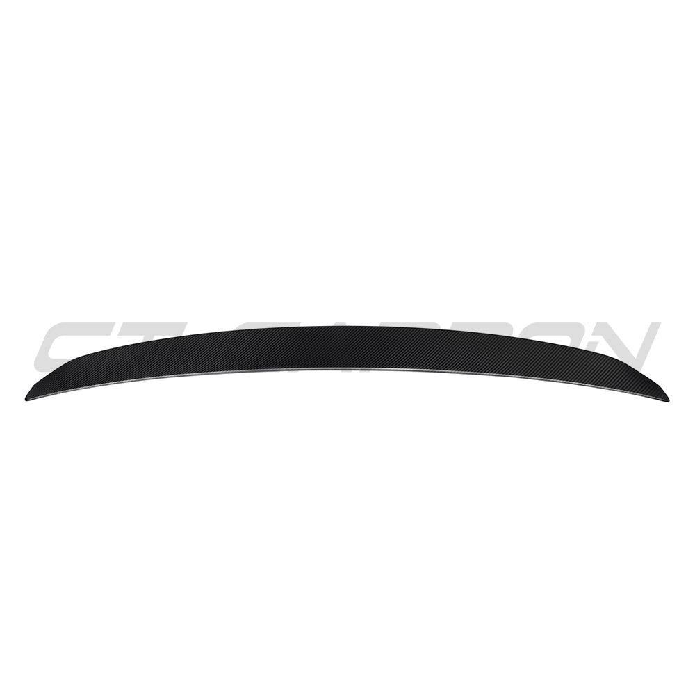 BMW G90 M5 and G60 5 Series 2023 carbon fiber spoiler by CT Carbon, showing the sleek, aerodynamic design and textured carbon finish.