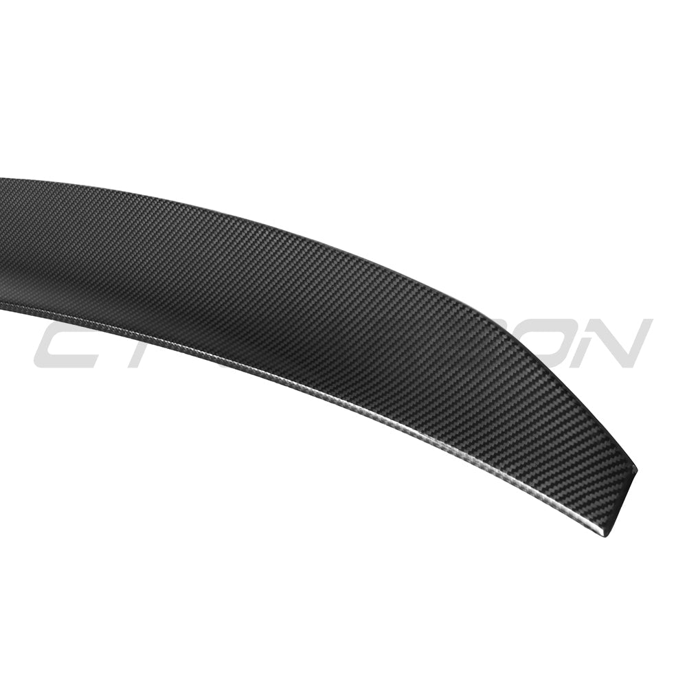 BMW G90 M5 and G60 5 Series 2023 carbon fibre spoiler by CT Carbon, showing the sleek, aerodynamic design on the vehicle.