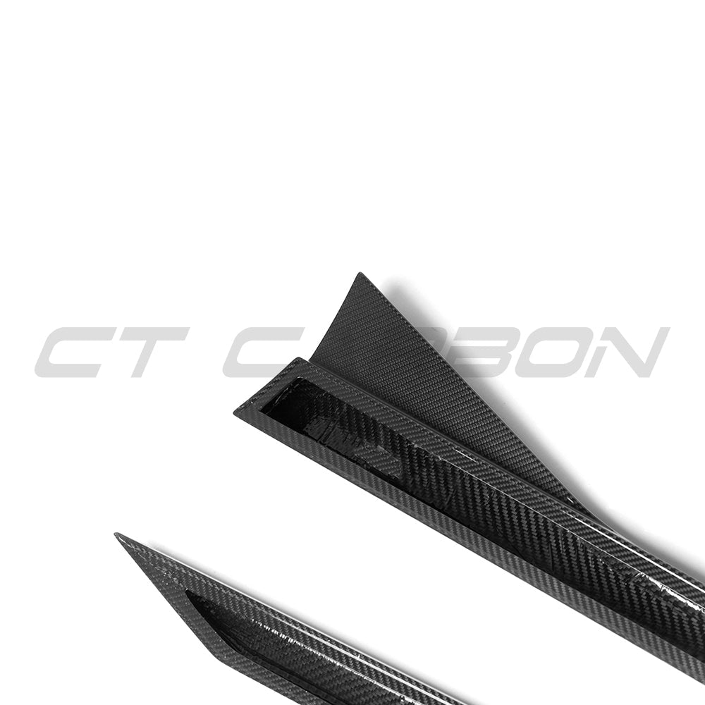 BMW G90 G99 M5 2024 carbon fiber side skirts by CT Carbon, shown installed on side of sporty sedan with sleek finish