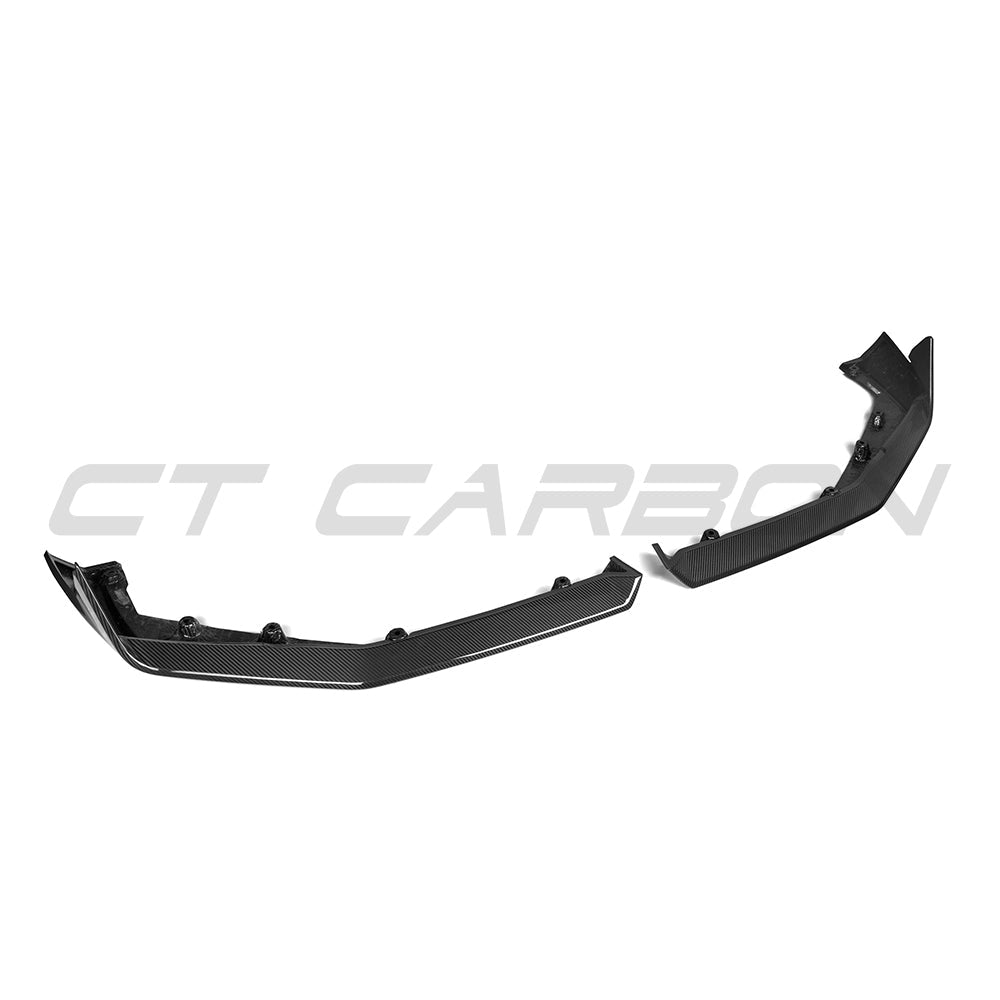 BMW G90 G99 M5 2024 CT Carbon fibre splitter mounted on front of the sports sedan, showcasing aerodynamic design and lightweight construction.