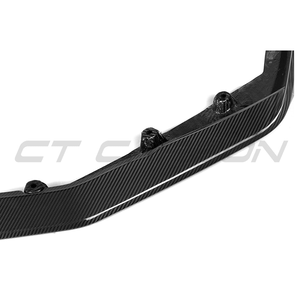 BMW G90 G99 M5 2024 CT Carbon fiber splitter for M5 Touring, showcasing sleek black carbon fiber detail, front aerodynamic enhancement.