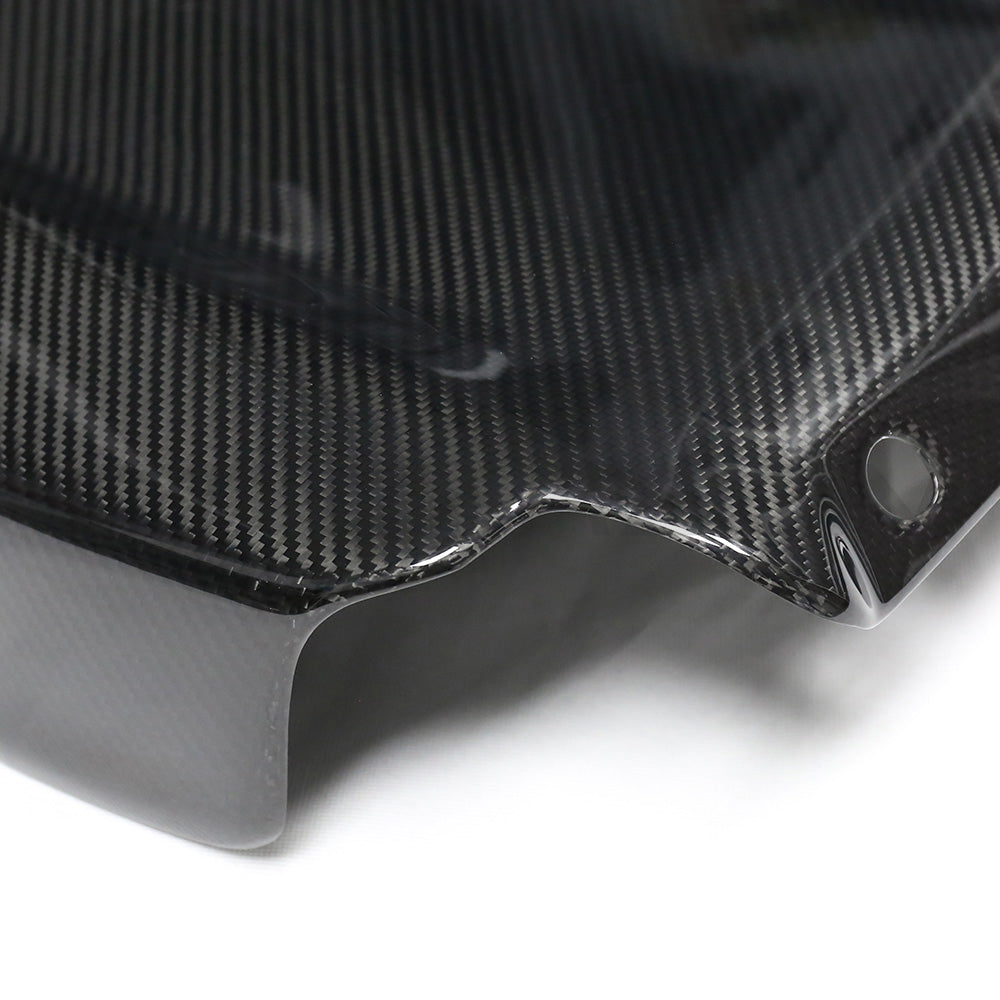 BMW GXX/F9X Carbon Fiber Seat Backs by CT Carbon, showcasing sleek, lightweight carbon fiber interior accessories for enhanced style and performance.