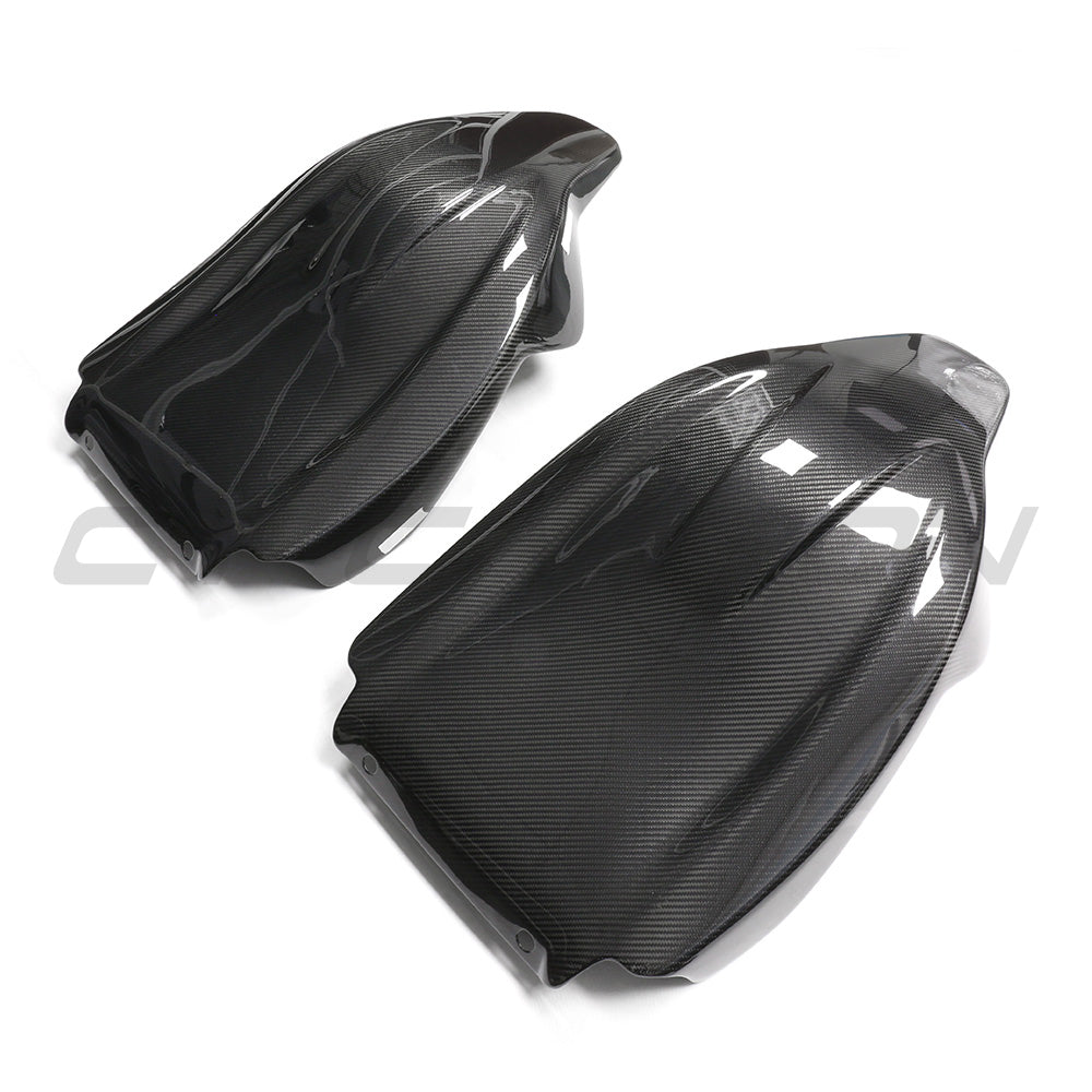 BMW GXX/F9X Carbon Fibre Seats Backs by CT Carbon, showcasing sleek, lightweight carbon fiber interior accessories for luxury vehicles.