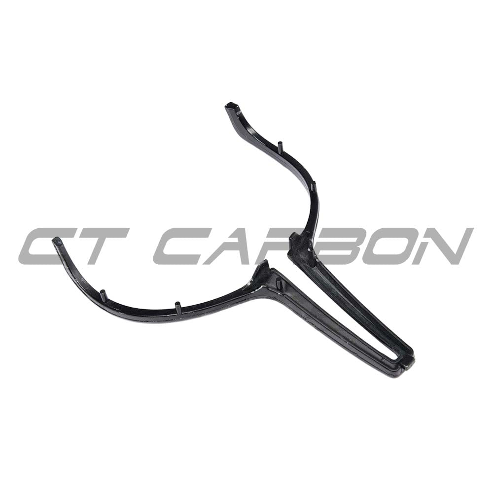 BMW M Fxx carbon fiber steering wheel trim by CT Carbon, showcasing sleek textured finish on the steering wheel accessory.