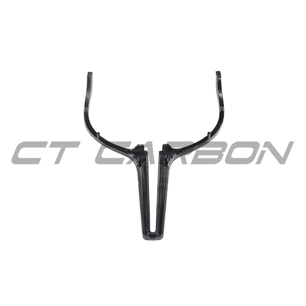 BMW M Fxx carbon fiber steering wheel trim accessory by CT Carbon, showcasing sleek black carbon fiber with detailed finish.